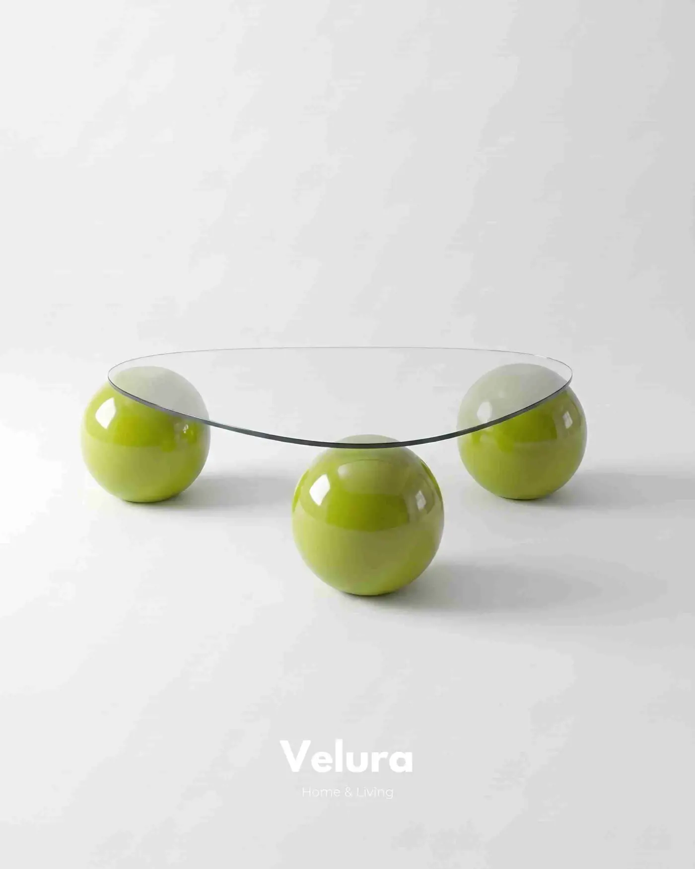 Geometrik tasarımlı fıstık yeşili küre ayaklı orta sehpa