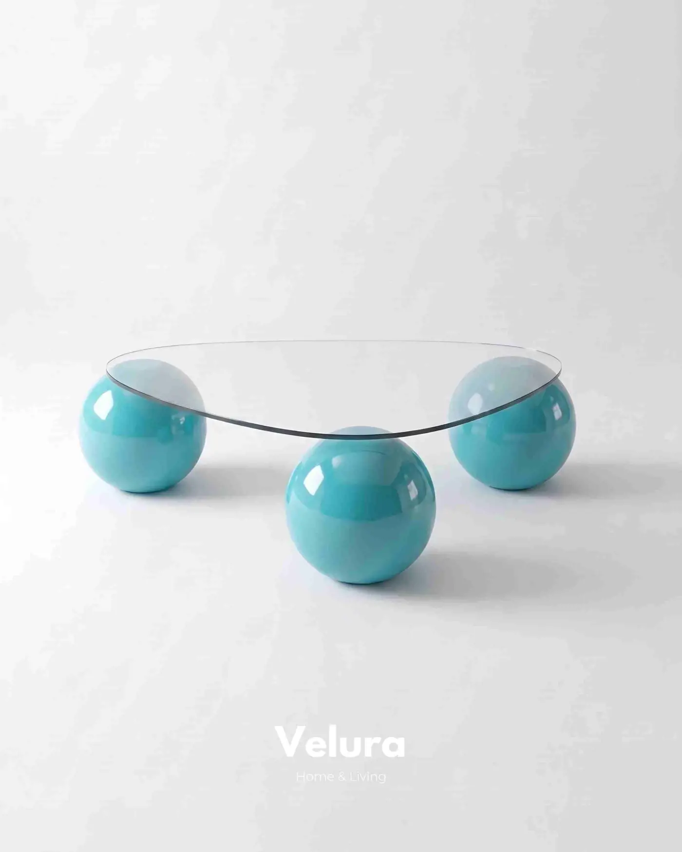 Geometrik tasarımlı turkuaz küre ayaklı cam sehpa
