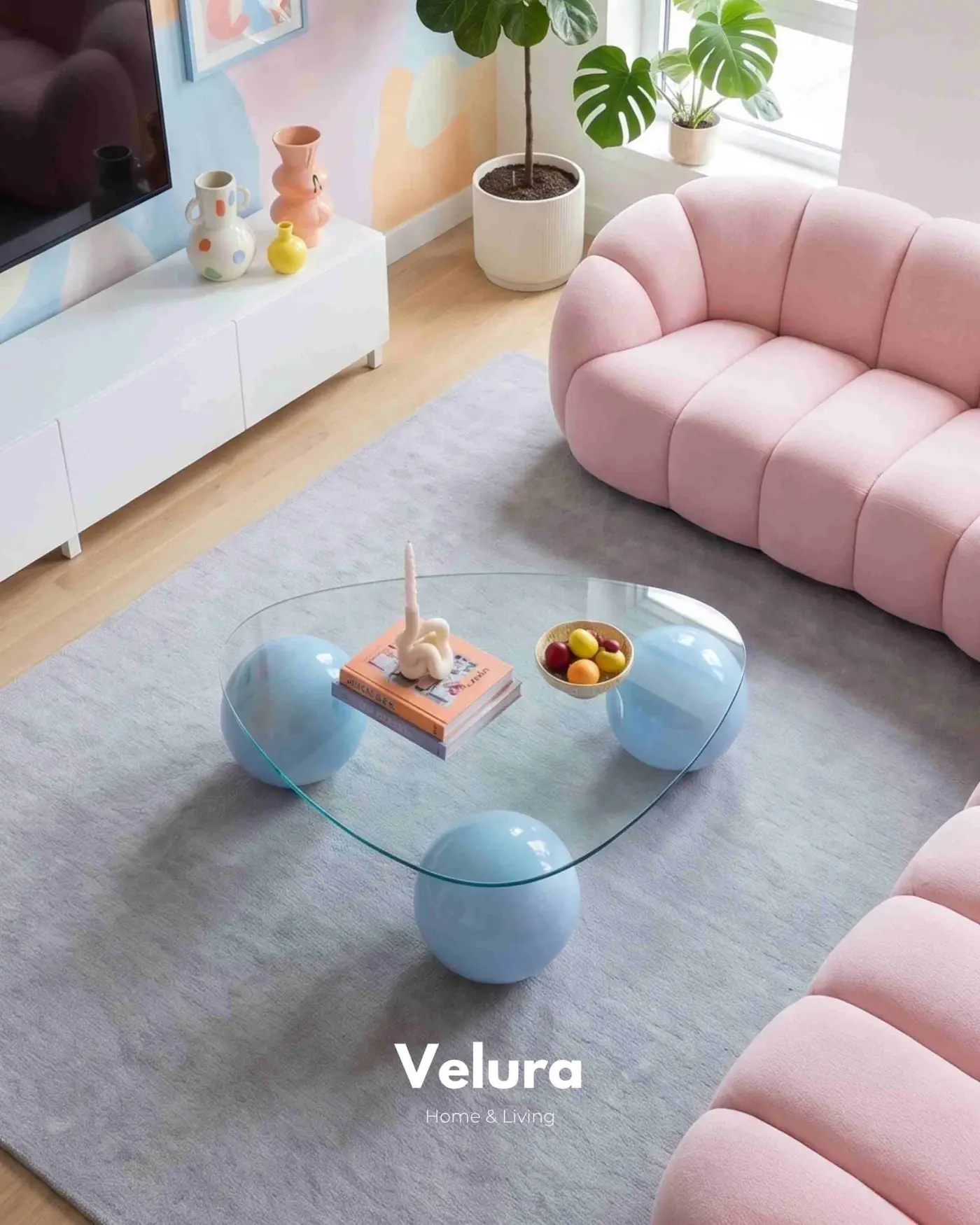 Geometrik tasarımlı açık mavi küre ayaklı cam sehpa